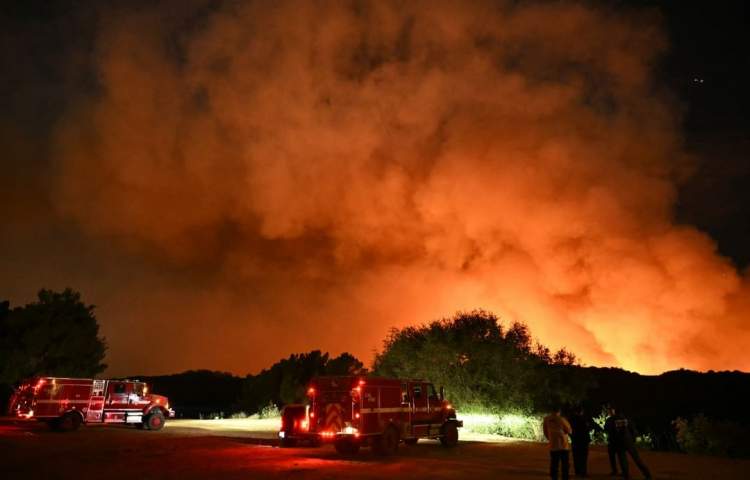 Death toll from California wildfires rises to 11